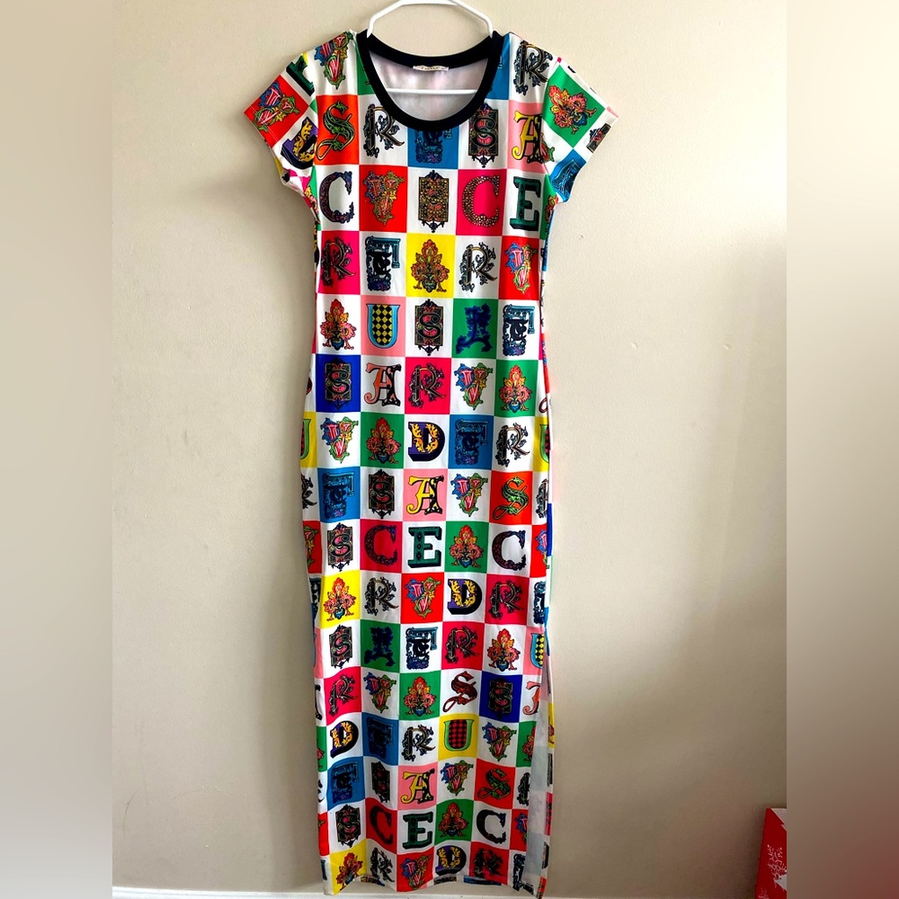 Never worn medium maxi letter print dress with low slit